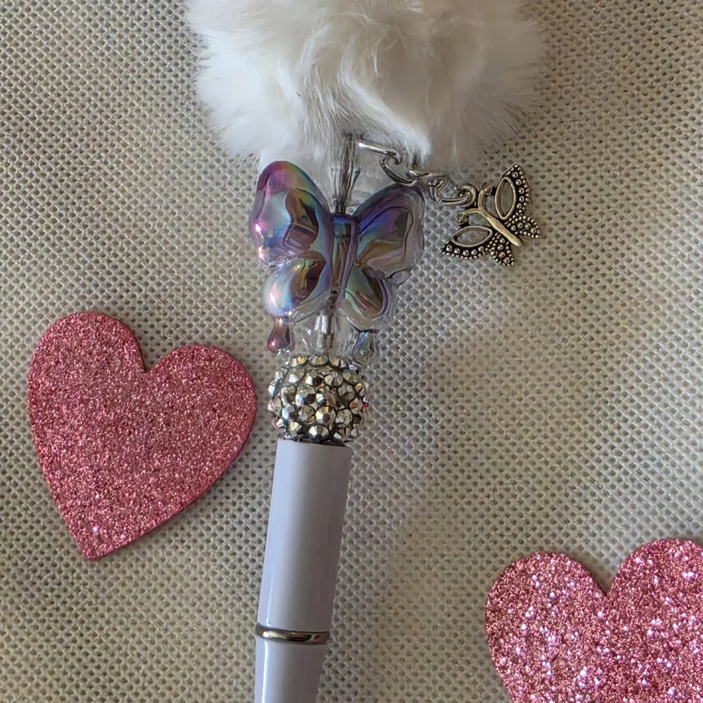 Fluffy White Pen with Butterfly Charm